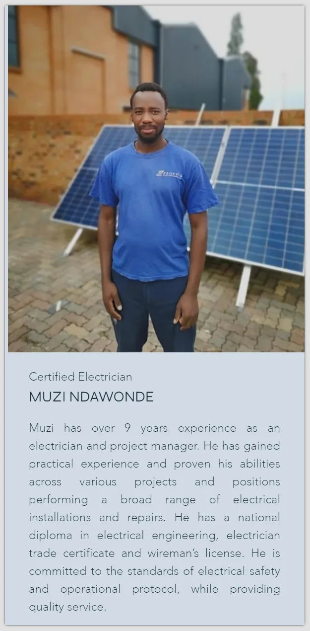 Muzi Ndawonde standing in front of a solar panel installation